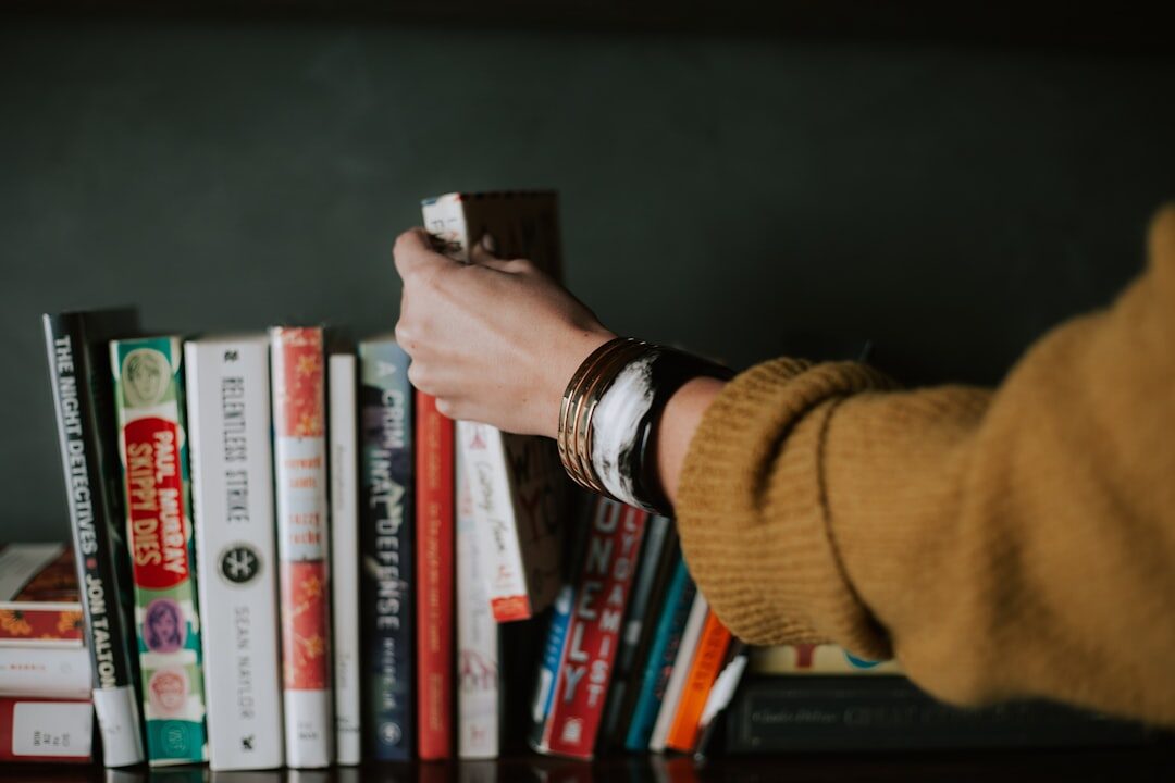 person reading mystery novel